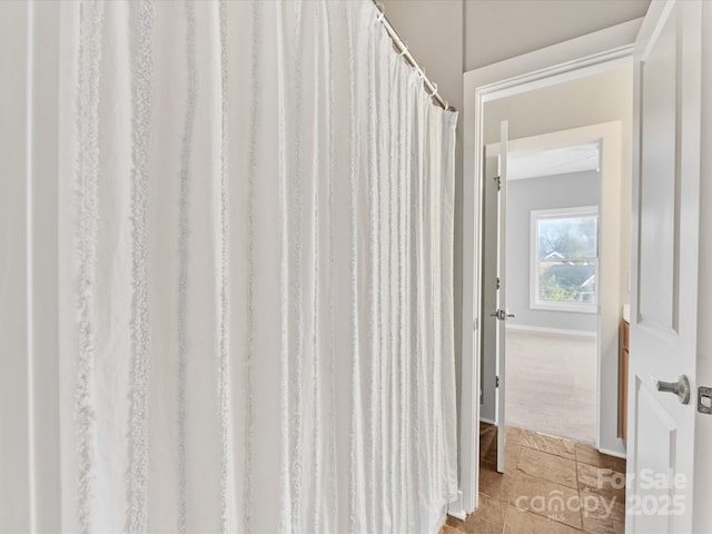corridor with baseboards