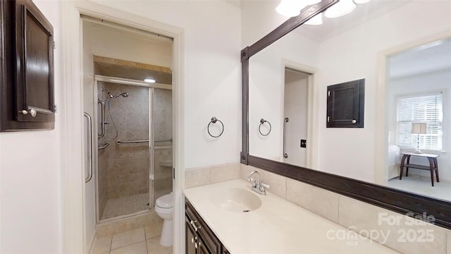 116 Jonas Dr, Lincolnton, NC 28092 - full bathroom with toilet, vanity, a stall shower, and tile patterned floors