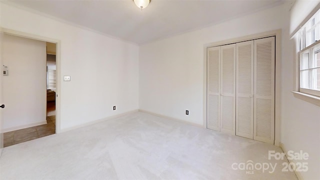 116 Jonas Dr, Lincolnton, NC 28092 - unfurnished bedroom featuring a closet and carpet floors