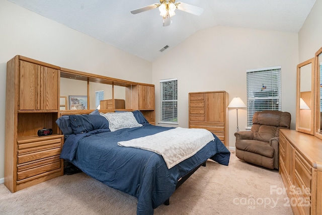bedroom featuring light carpet, high vaulted ceiling, and ceiling fan