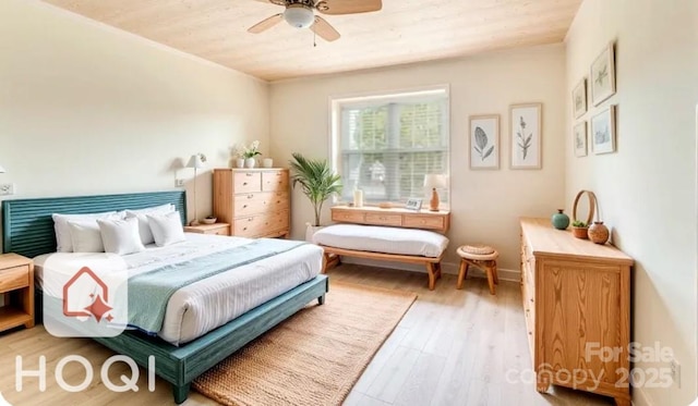 bedroom featuring wood finished floors and a ceiling fan
