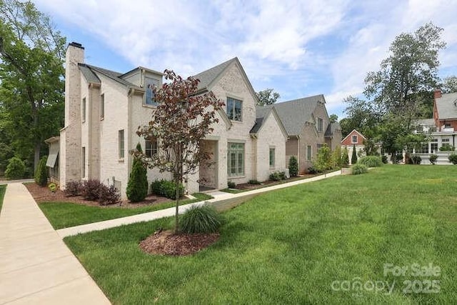 3119 Knowlton Ln, Charlotte, NC 28205 - view of front of house with a front yard, a chimney, and a residential view