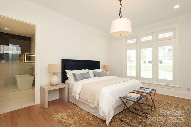 3119 Knowlton Ln, Charlotte, NC 28205 - bedroom featuring wood finished floors, crown molding, and recessed lighting