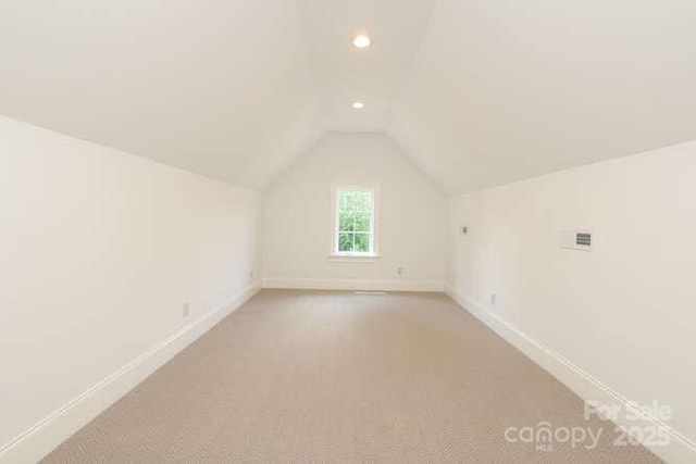 3119 Knowlton Ln, Charlotte, NC 28205 - additional living space featuring baseboards, lofted ceiling, recessed lighting, and light colored carpet