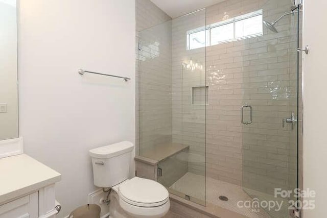 3119 Knowlton Ln, Charlotte, NC 28205 - full bathroom with toilet, vanity, and a shower stall