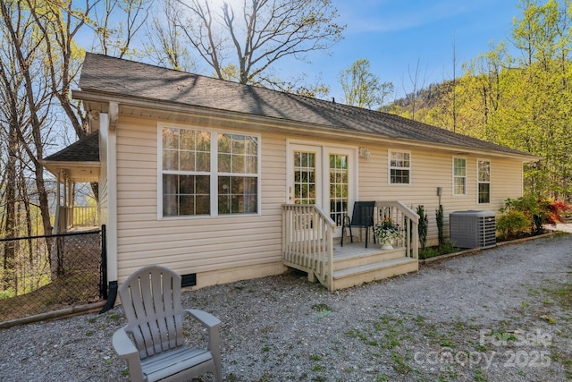 12 Hutchinson Woods Dr, Fletcher, NC 28732 - back of property featuring central air condition unit, fence, a shingled roof, and crawl space
