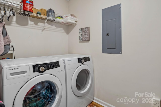 12 Hutchinson Woods Dr, Fletcher, NC 28732 - laundry room with baseboards, laundry area, washer and clothes dryer, and electric panel