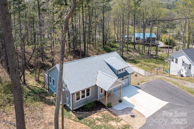 209 Fall Leaves Dr, Fairview, NC 28730 - view of subject property featuring a heavily wooded area