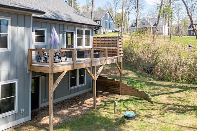 209 Fall Leaves Dr, Fairview, NC 28730 - back of property with board and batten siding, a wooden deck, a residential view, and a shingled roof