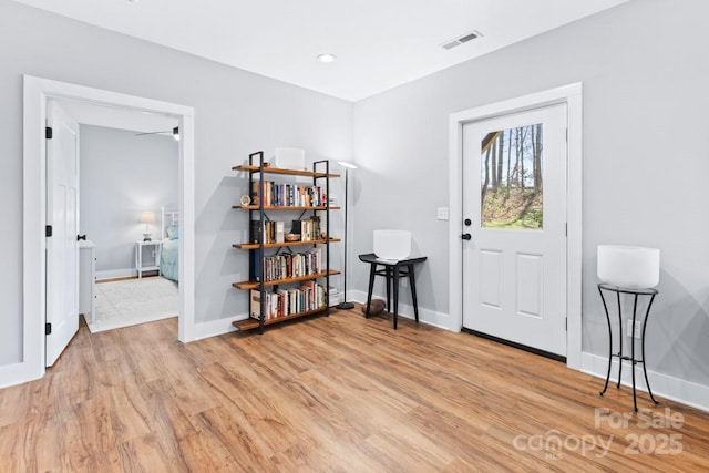 209 Fall Leaves Dr, Fairview, NC 28730 - foyer entrance featuring light wood finished floors and baseboards