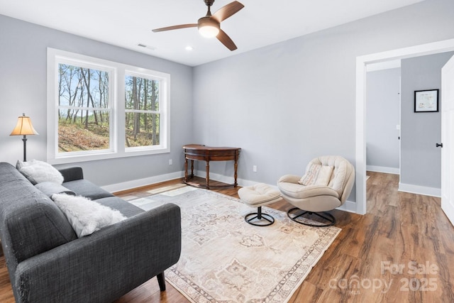 209 Fall Leaves Dr, Fairview, NC 28730 - living area with ceiling fan and wood finished floors