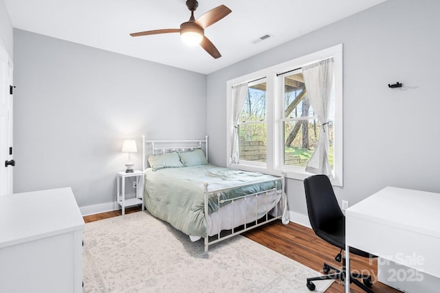 209 Fall Leaves Dr, Fairview, NC 28730 - bedroom with wood finished floors, an office area, and ceiling fan