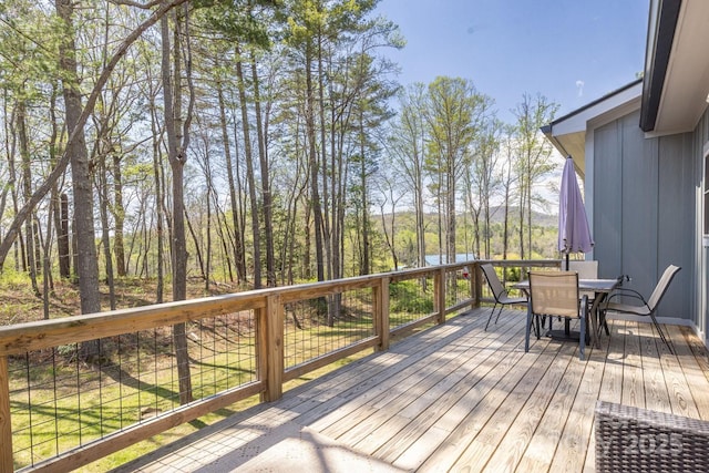 209 Fall Leaves Dr, Fairview, NC 28730 - wooden deck with outdoor dining area