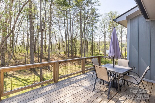 209 Fall Leaves Dr, Fairview, NC 28730 - wooden deck featuring outdoor dining area
