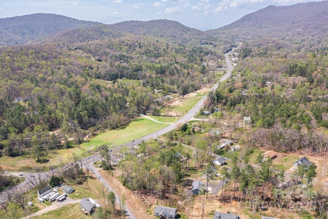 209 Fall Leaves Dr, Fairview, NC 28730 - aerial view of property's location featuring a mountainous background and a heavily wooded area