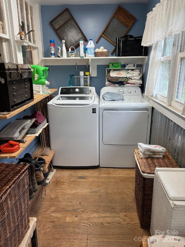 212 S Mitchell Ave, Bakersville, NC 28705 - washroom with washer and clothes dryer, wood finished floors, and laundry area