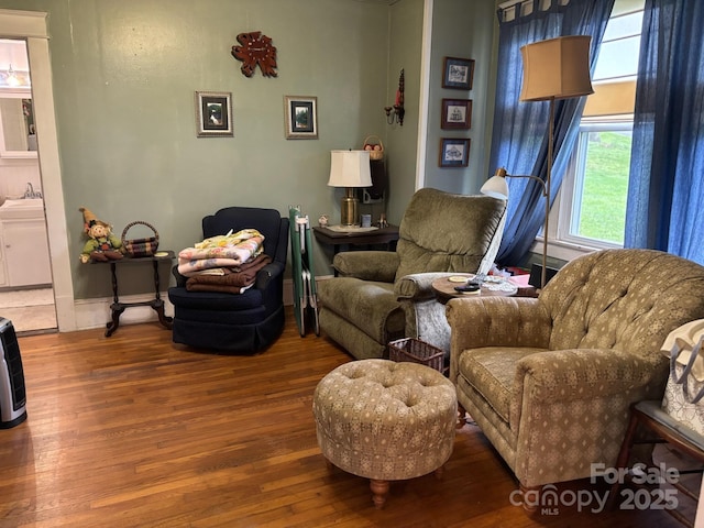 212 S Mitchell Ave, Bakersville, NC 28705 - living room with wood finished floors and baseboards