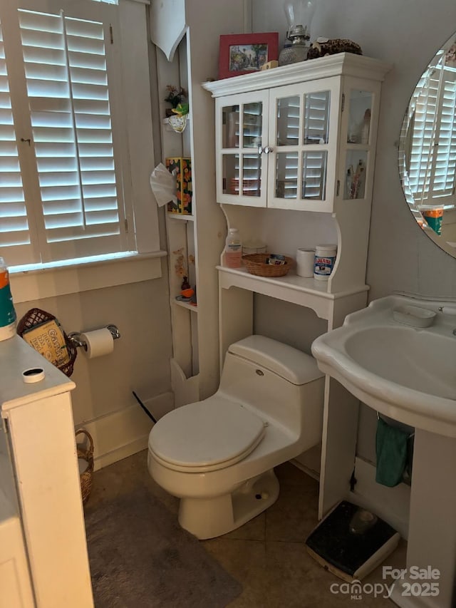 212 S Mitchell Ave, Bakersville, NC 28705 - half bathroom featuring tile patterned floors and toilet