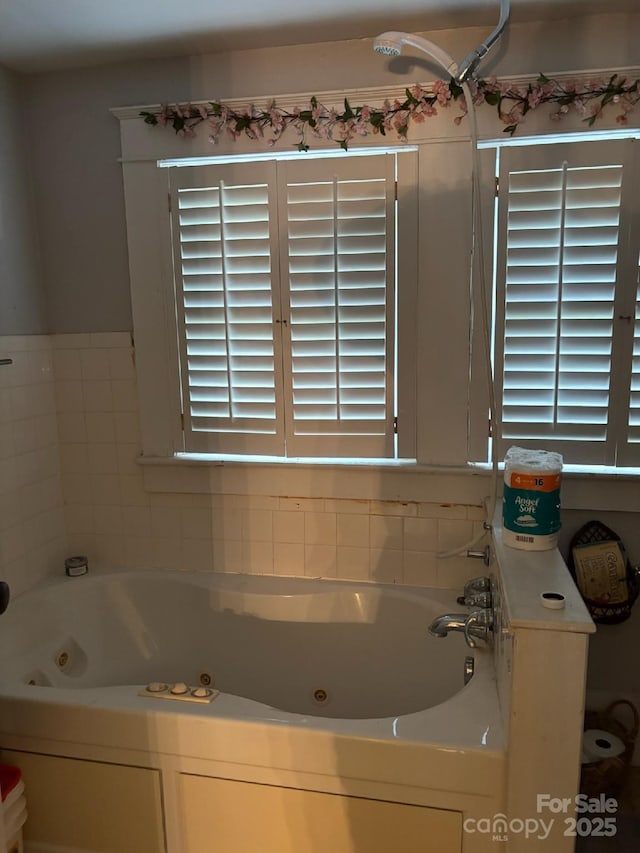 212 S Mitchell Ave, Bakersville, NC 28705 - bathroom featuring a tub with jets
