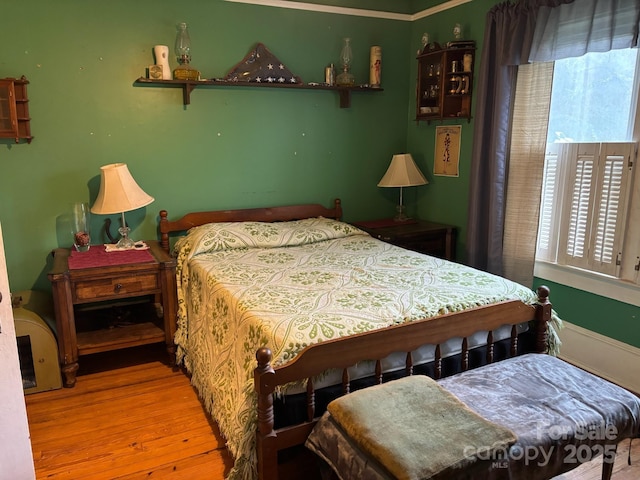 212 S Mitchell Ave, Bakersville, NC 28705 - bedroom featuring wood finished floors