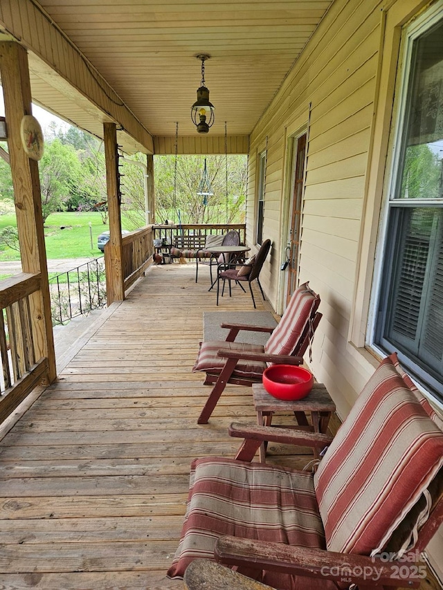 212 S Mitchell Ave, Bakersville, NC 28705 - deck with covered porch