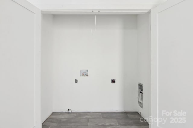 clothes washing area with laundry area and hookup for a washing machine