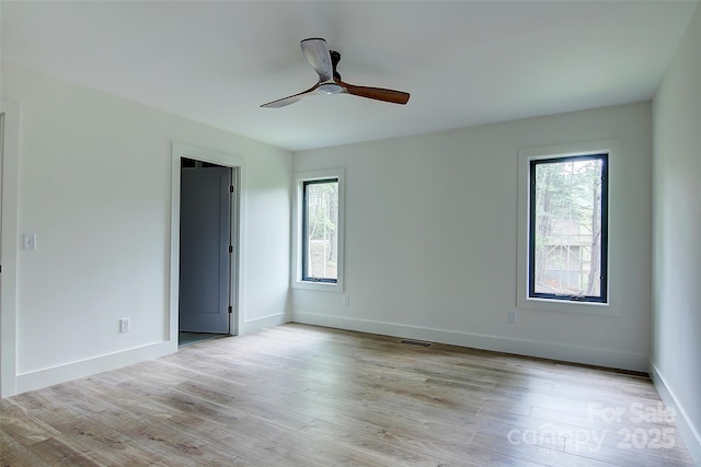 181 Curly Maple Dr, Canton, NC 28716 - empty room featuring a ceiling fan, baseboards, visible vents, and light wood finished floors