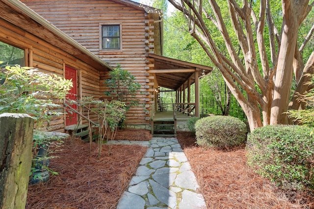 view of yard with covered porch