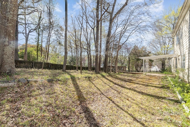 view of yard with fence