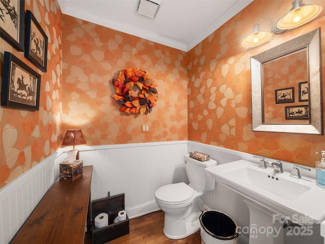 12 Clubside Dr, Asheville, NC 28804 - bathroom with wallpapered walls, ornamental molding, wood finished floors, and wainscoting