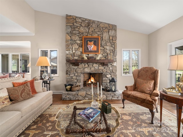 12 Clubside Dr, Asheville, NC 28804 - living room featuring baseboards, a fireplace, wood finished floors, and vaulted ceiling