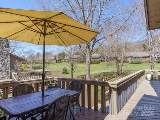 12 Clubside Dr, Asheville, NC 28804 - wooden deck featuring outdoor dining space and a lawn