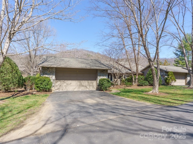 12 Clubside Dr, Asheville, NC 28804 - view of front of home with a front lawn, driveway, and stone siding