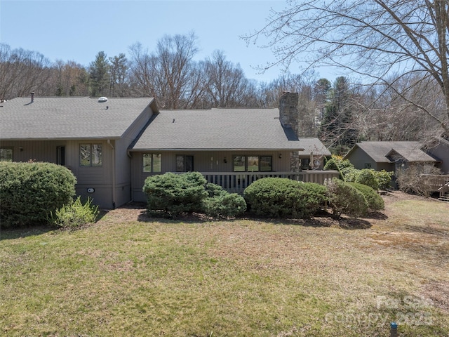 12 Clubside Dr, Asheville, NC 28804 - rear view of house with a yard and a chimney