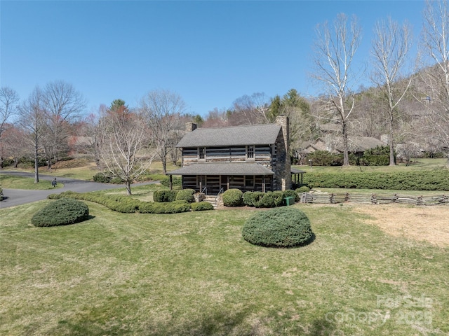 12 Clubside Dr, Asheville, NC 28804 - exterior space with covered porch, a front lawn, roof with shingles, and a chimney
