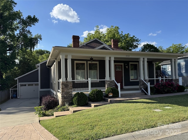 view of front facade with a chimney, a garage, a porch, concrete driveway, and a front yard