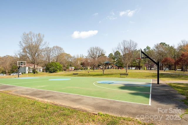view of sport court with community basketball court and a yard