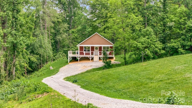 37 Garland Ball Dr, Alexander, NC 28701 - view of front facade with a front lawn, a porch, and driveway