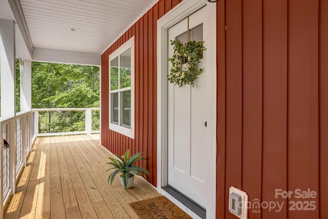 37 Garland Ball Dr, Alexander, NC 28701 - doorway to property with a porch and board and batten siding