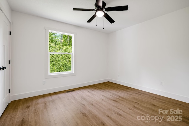 37 Garland Ball Dr, Alexander, NC 28701 - unfurnished room with wood finished floors, baseboards, and a ceiling fan