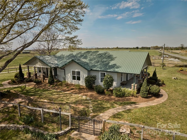 570 Lambs Grill Rd, Rutherfordton, NC 28139 - view of front of property featuring a gate, a fenced front yard, metal roof, and a front yard