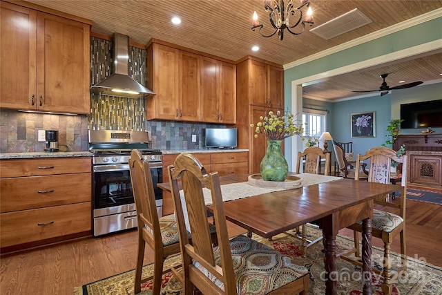570 Lambs Grill Rd, Rutherfordton, NC 28139 - dining space with visible vents, ornamental molding, light wood-style floors, ceiling fan with notable chandelier, and wood ceiling