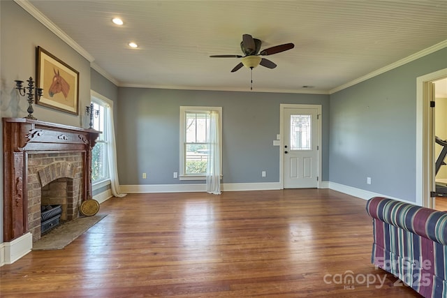 570 Lambs Grill Rd, Rutherfordton, NC 28139 - unfurnished living room featuring a fireplace, wood finished floors, ornamental molding, and a ceiling fan