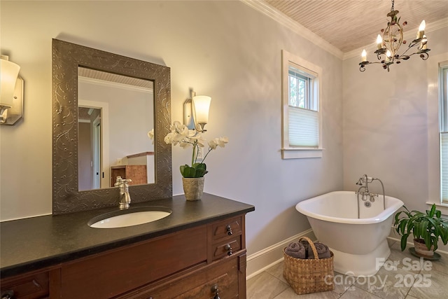 570 Lambs Grill Rd, Rutherfordton, NC 28139 - bathroom featuring tile patterned floors, a notable chandelier, vanity, a soaking tub, and ornamental molding
