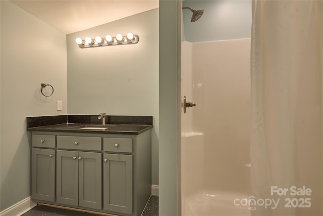 570 Lambs Grill Rd, Rutherfordton, NC 28139 - full bathroom featuring baseboards, lofted ceiling, vanity, and a shower with curtain