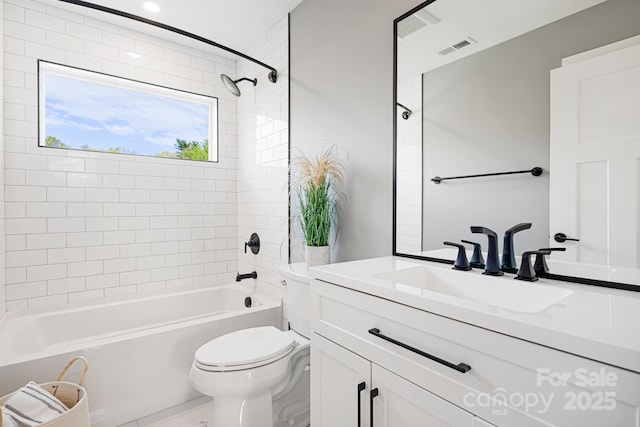bathroom with toilet, visible vents, washtub / shower combination, and vanity