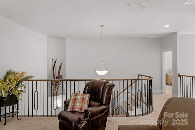 living area with an upstairs landing, carpet, baseboards, and recessed lighting
