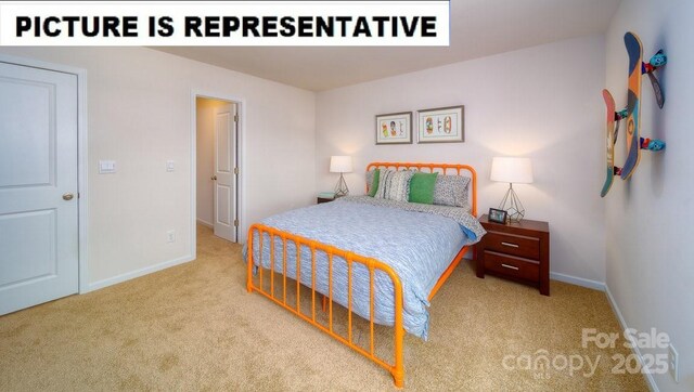bedroom with baseboards and carpet floors