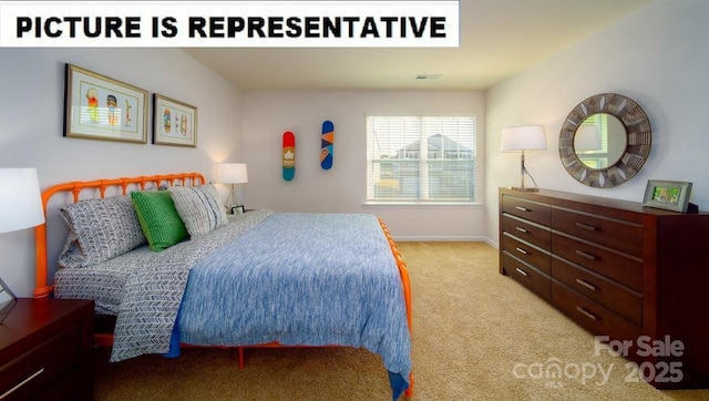 bedroom with baseboards and light carpet