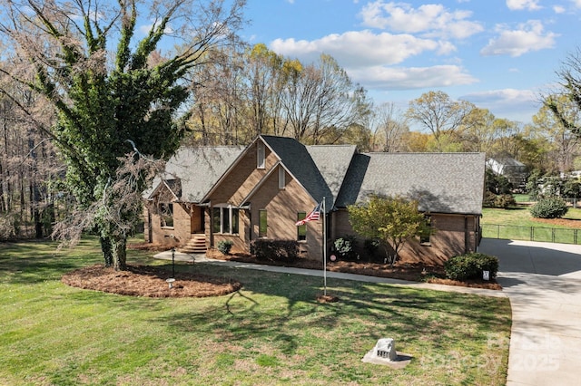 7146 Sifford Rd, Stanley, NC 28164 - view of front facade featuring brick siding, roof with shingles, and driveway